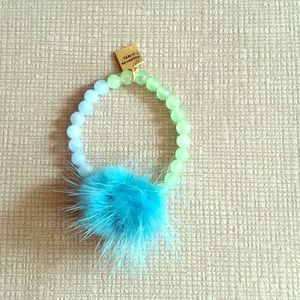 NWT Cute blue and green bracelet with blue Pom Pom